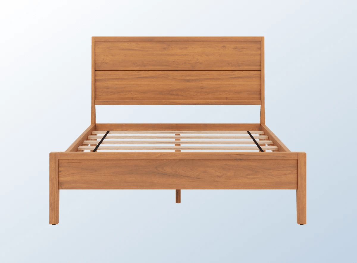 A rendered image of the Ludlow Bed Frame in a bedroom scene