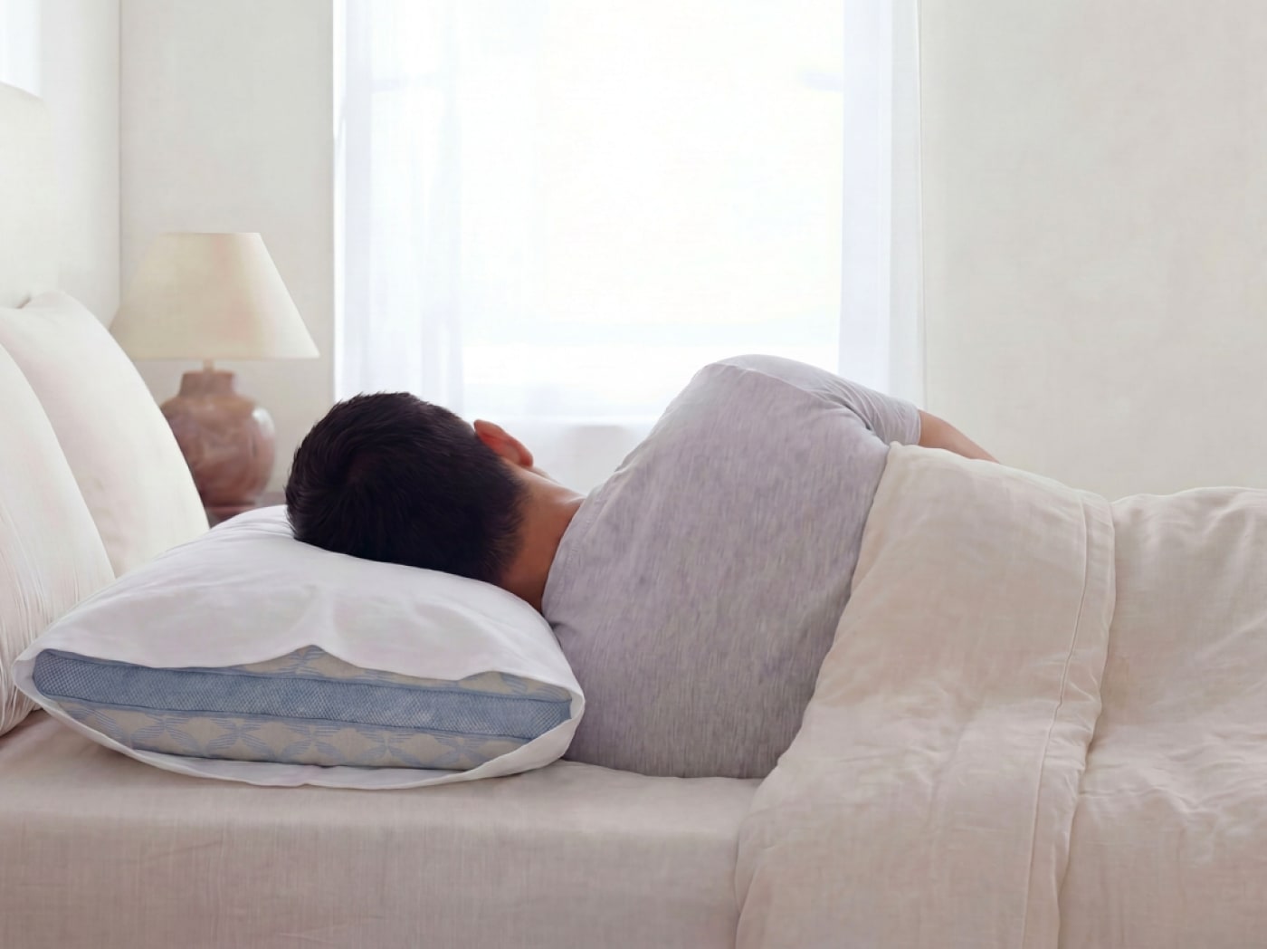 An image of a made sleeping on the Cooling Memory Foam Pillow