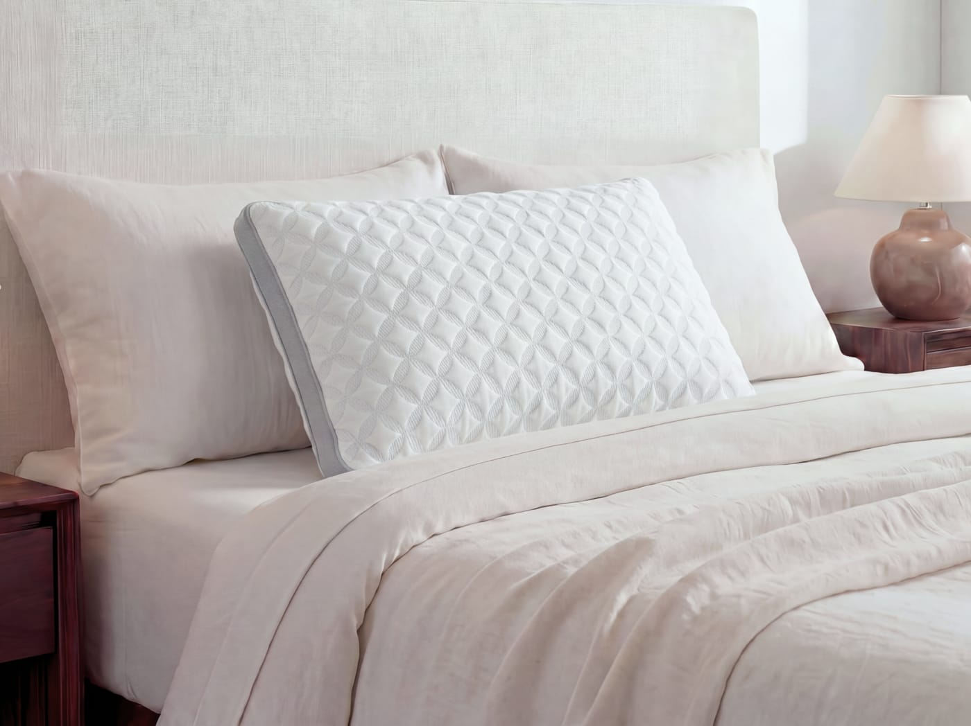 A closeup of the Talalay Latex Pillow on a bed