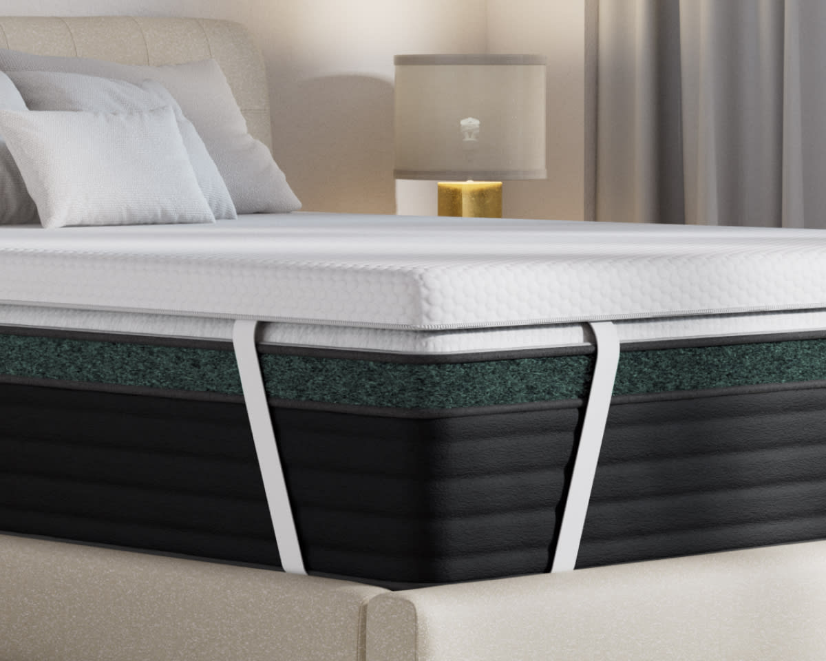 A rendered image of the ErgoAlign Mattress Topper in a bedroom scene
