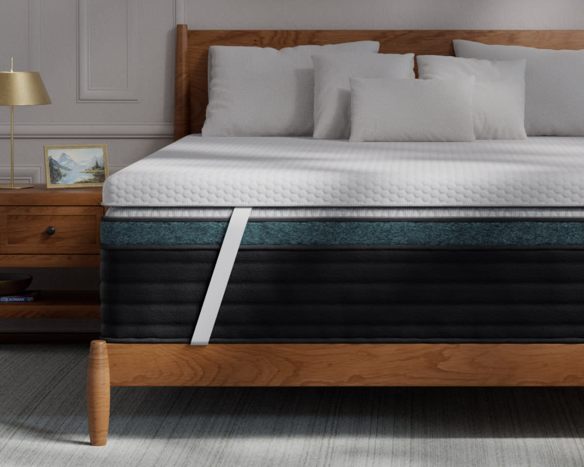 A rendered image of the Premium Memory Foam Mattress Topper in a bedroom scene