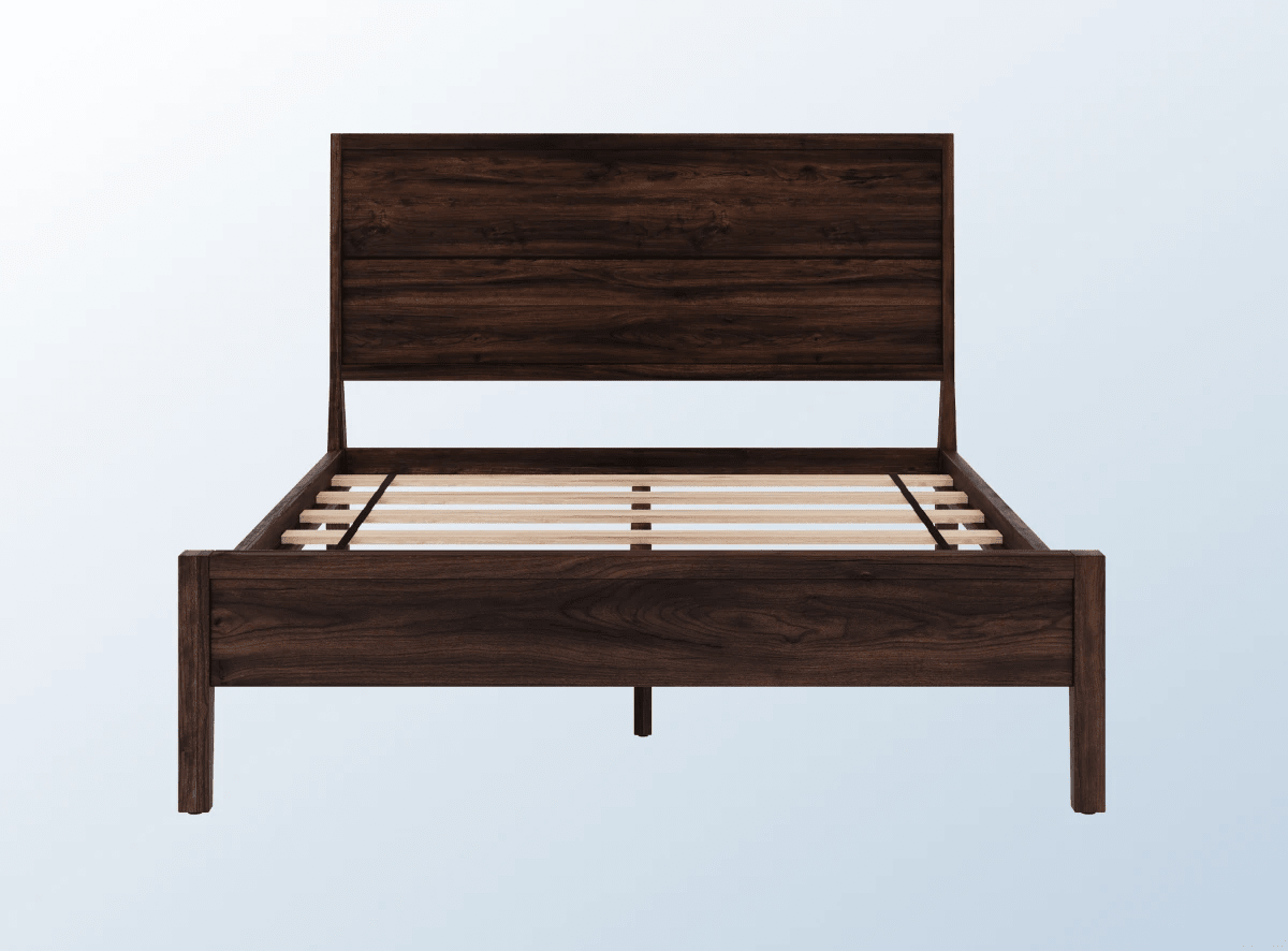 A rendered image of the Ludlow Bed Frame in a bedroom scene