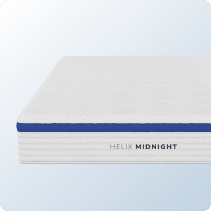 A product image of the Helix Midnight mattress on a blue background gradient