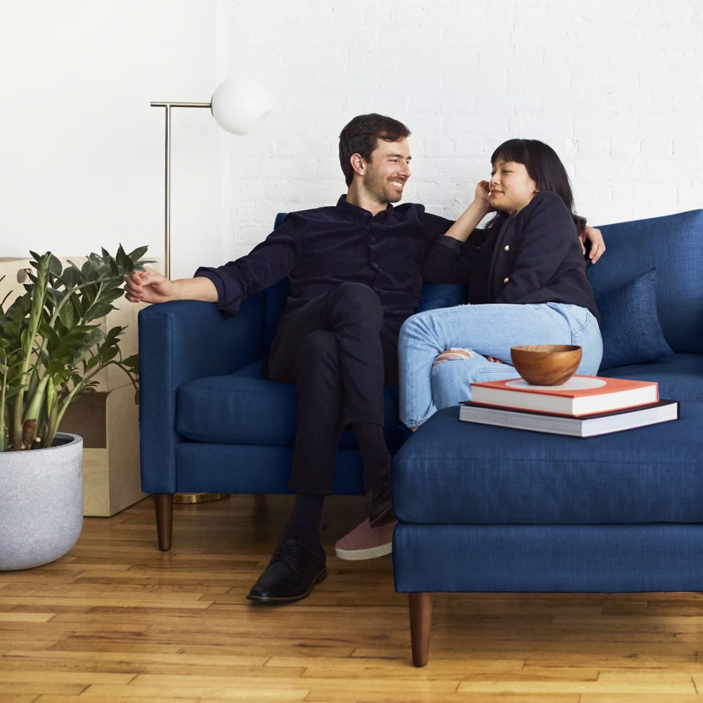 Couple Resting on an Allform Modular Sofa