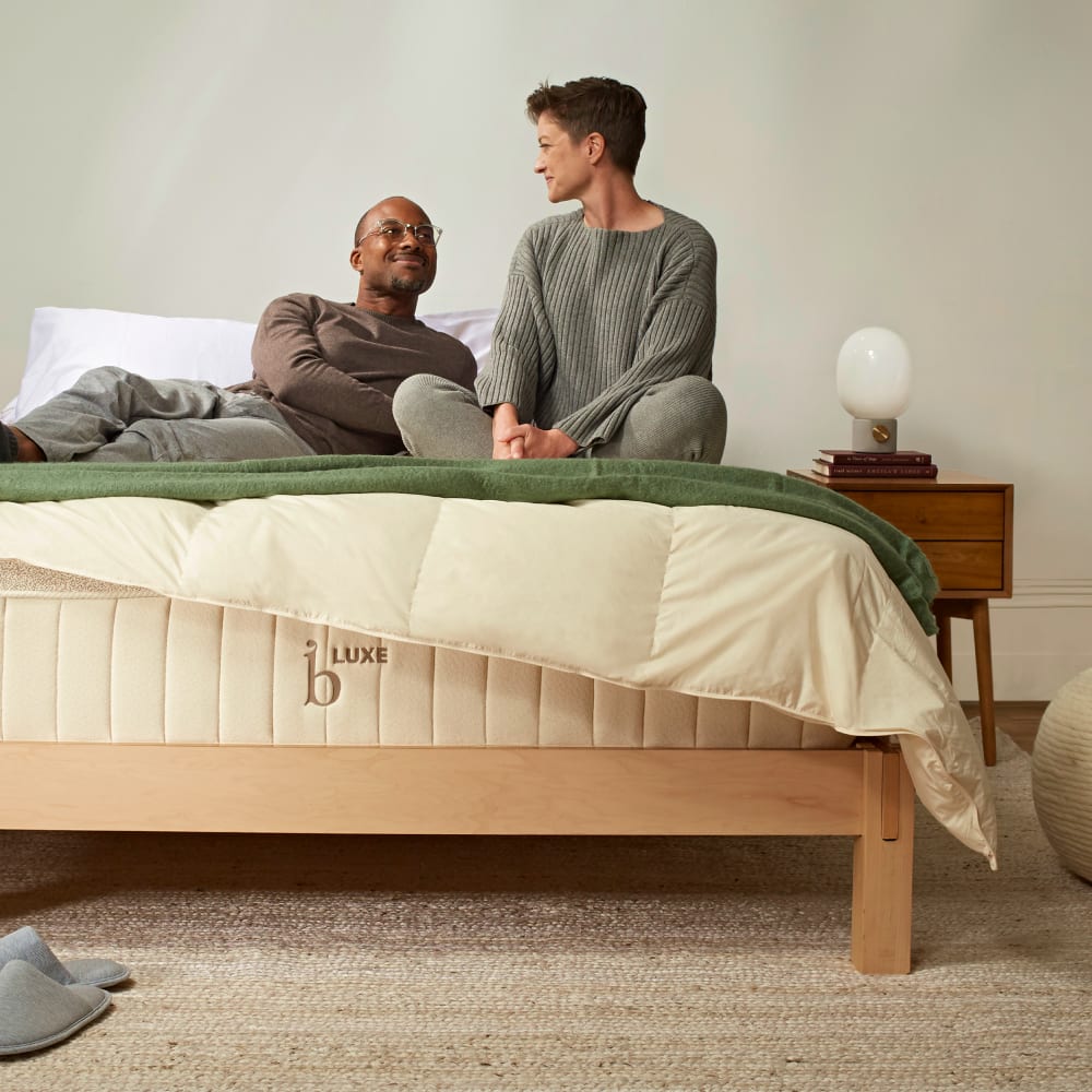 Couple Laying on Birch Mattress