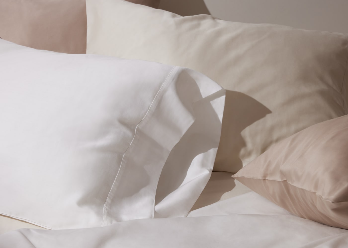 pillowcases and sheets on bed