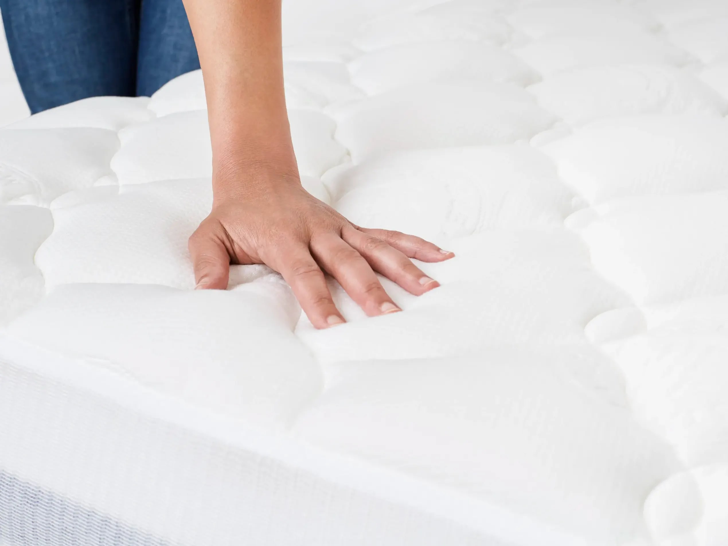 Woman Feeling Our Helix Extra Plush Pillow Topper