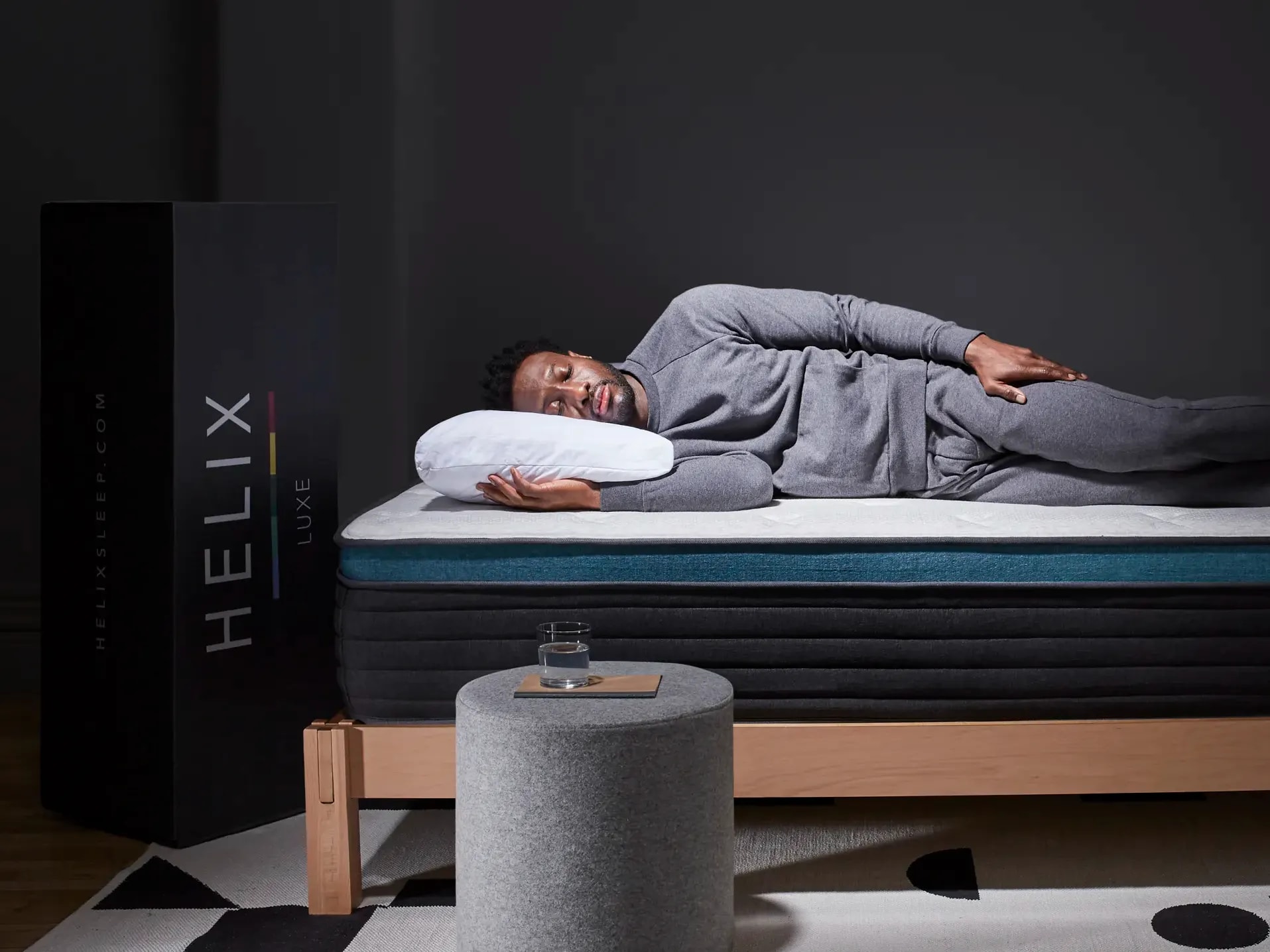 Man Sleep on his Helix Sunset Luxe Mattress