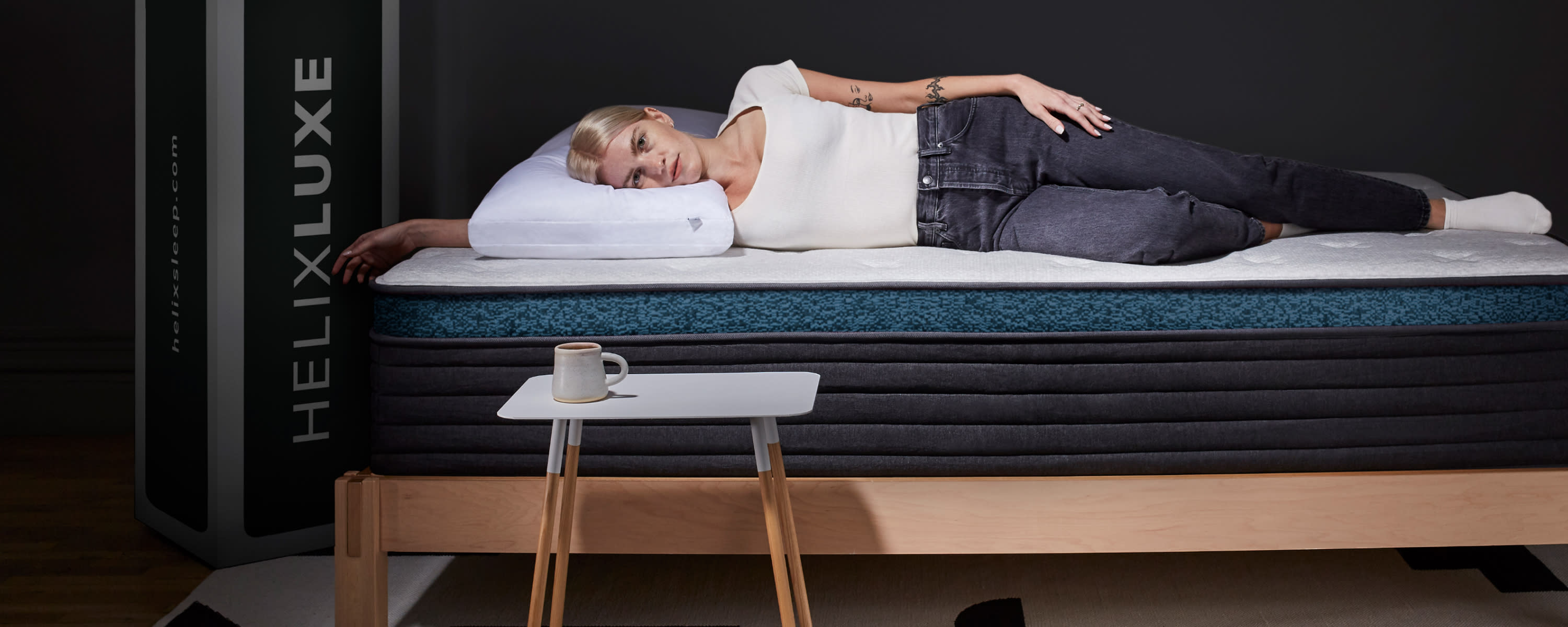 Sleepers laying on Helix Luxe Mattress