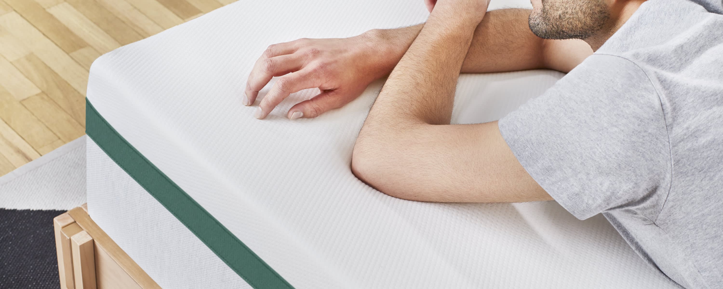 Close-up of man laying on Helix mattress