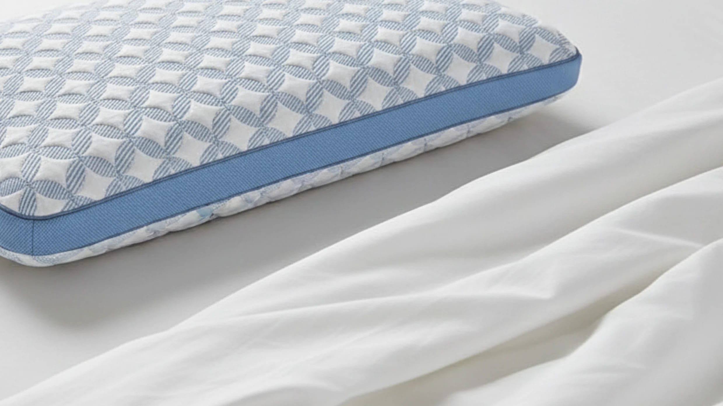 A lifestyle image showing a closeup of the Helix GlacioTex Cooling Memory Foam Pillow
