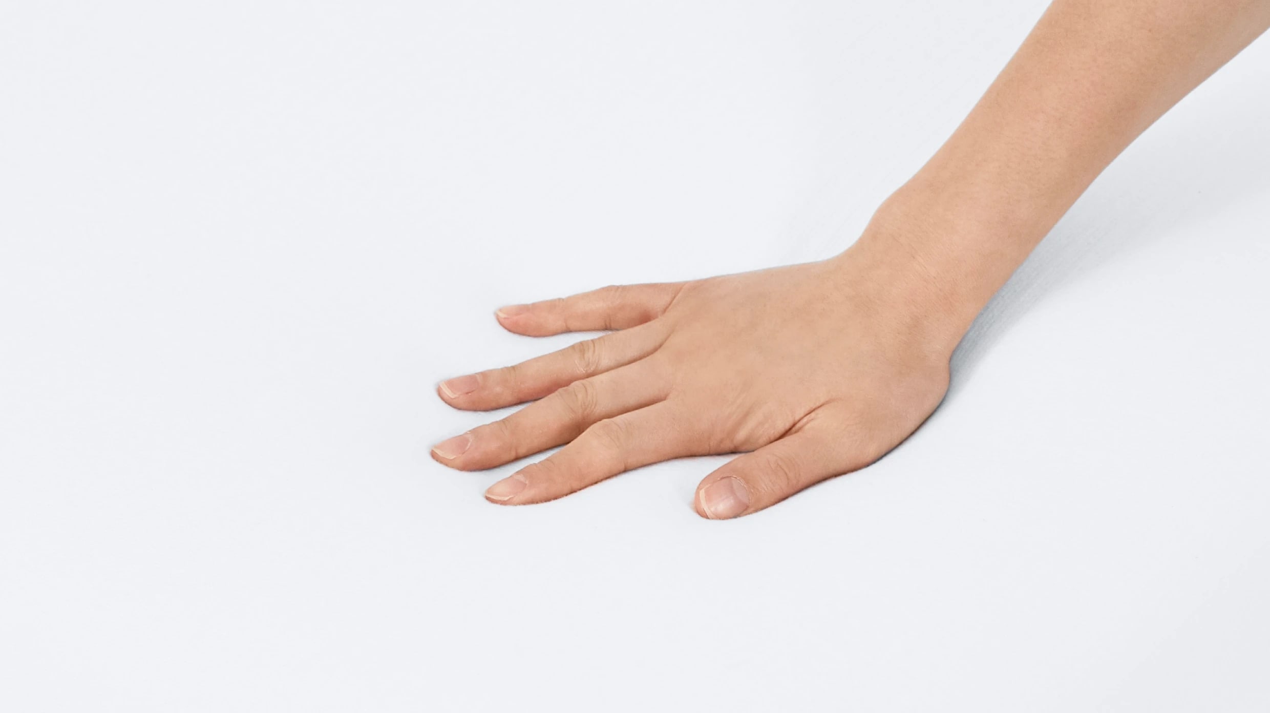 A lifestyle image showing a closeup of the Helix Waterproof Mattress Encasement