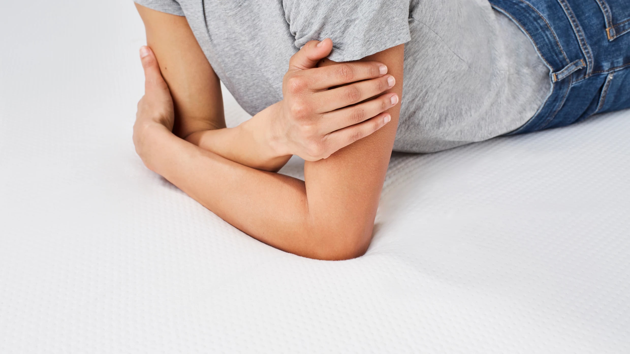 A lifestyle image showing a closeup of the Helix Waterproof Mattress Protector