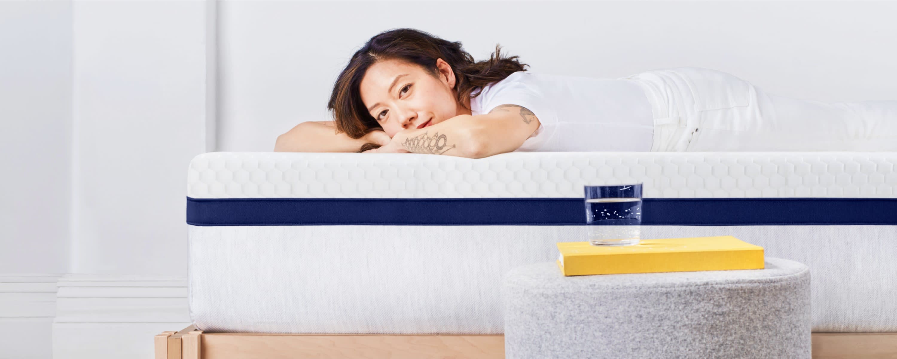 Person laying on Helix Midnight mattress