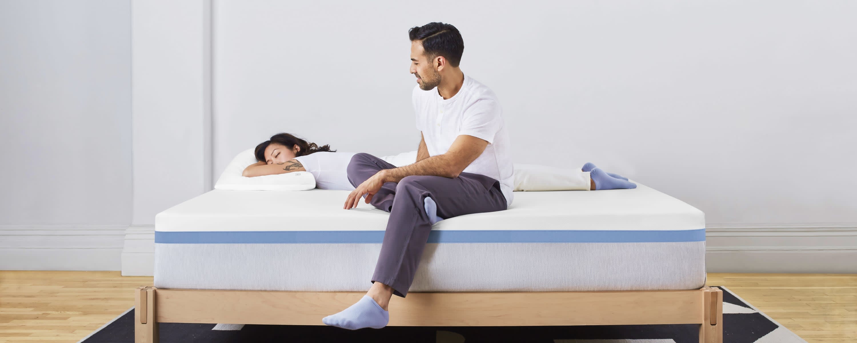 Two people on Helix Moonlight mattress