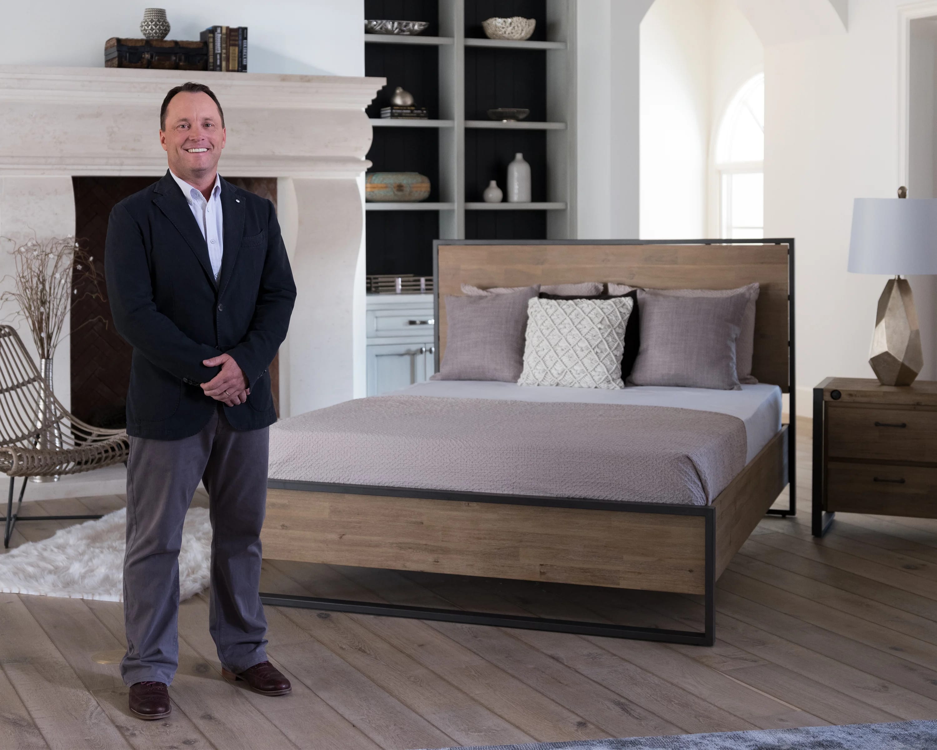 Brooklyn Bedding Owner John Merwin in bedroom with Brooklyn Bedding Mattress