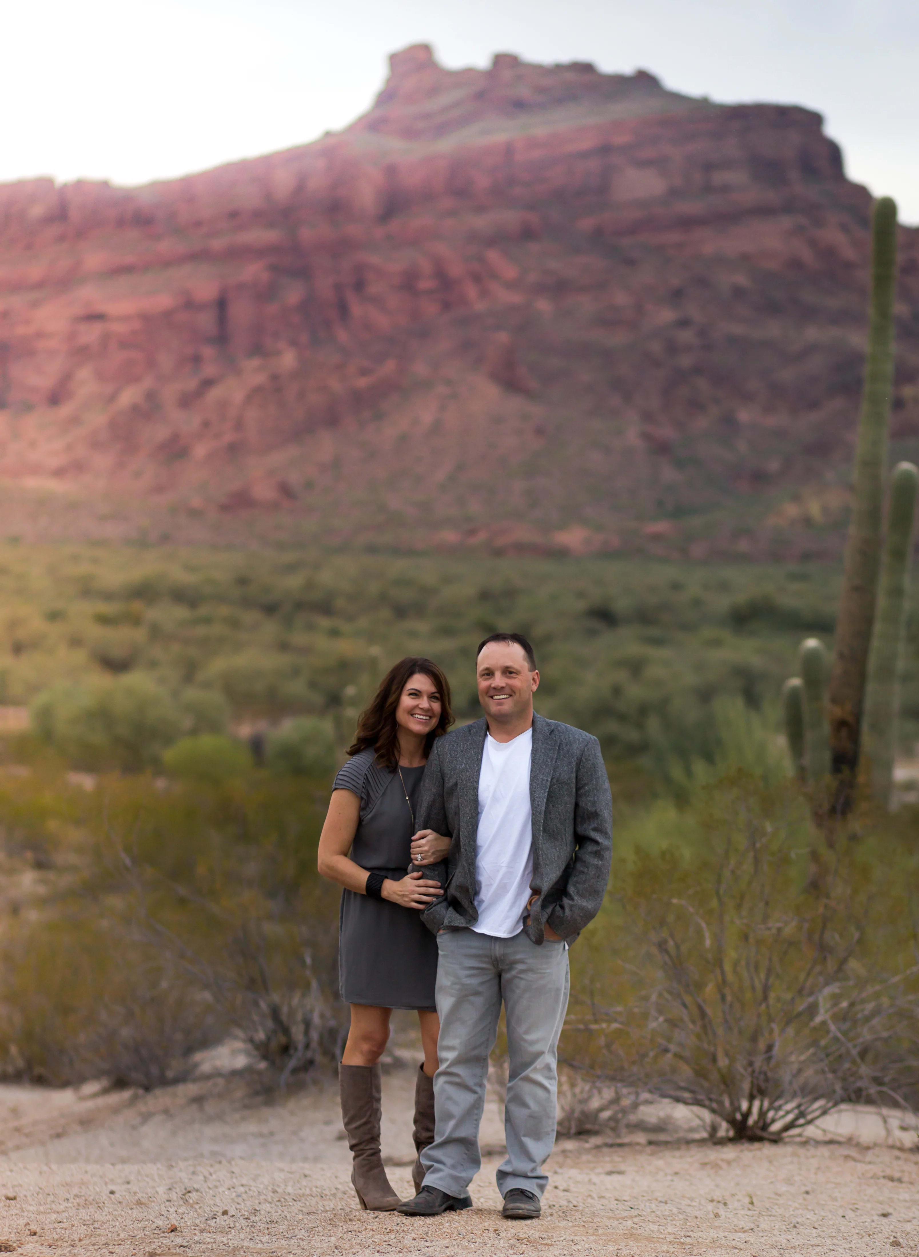 Brooklyn Bedding Owner John Merwin and Wife Kristin Merwin in front of red rock mountain