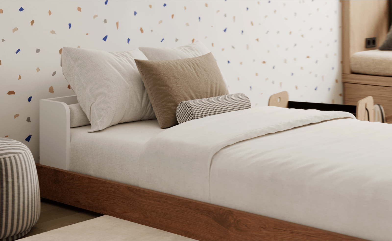A rendered image showing the Bryant Bed Frame in a bedroom scene with bedding and pillows.