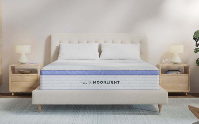 A rendered image of the Helix Moonlight mattress in a bedroom scene