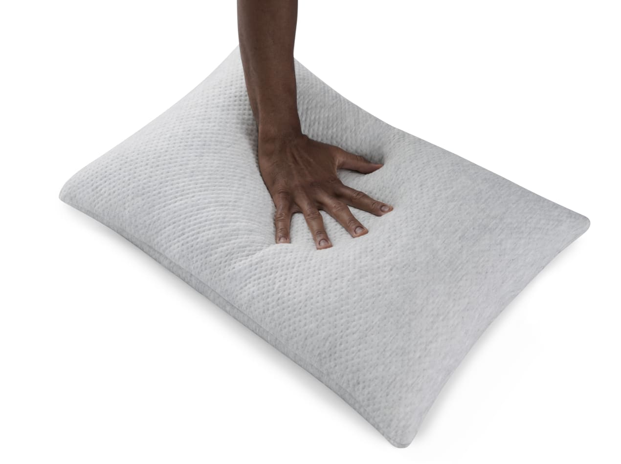 Hand pressing into Talalay Latex Pillow