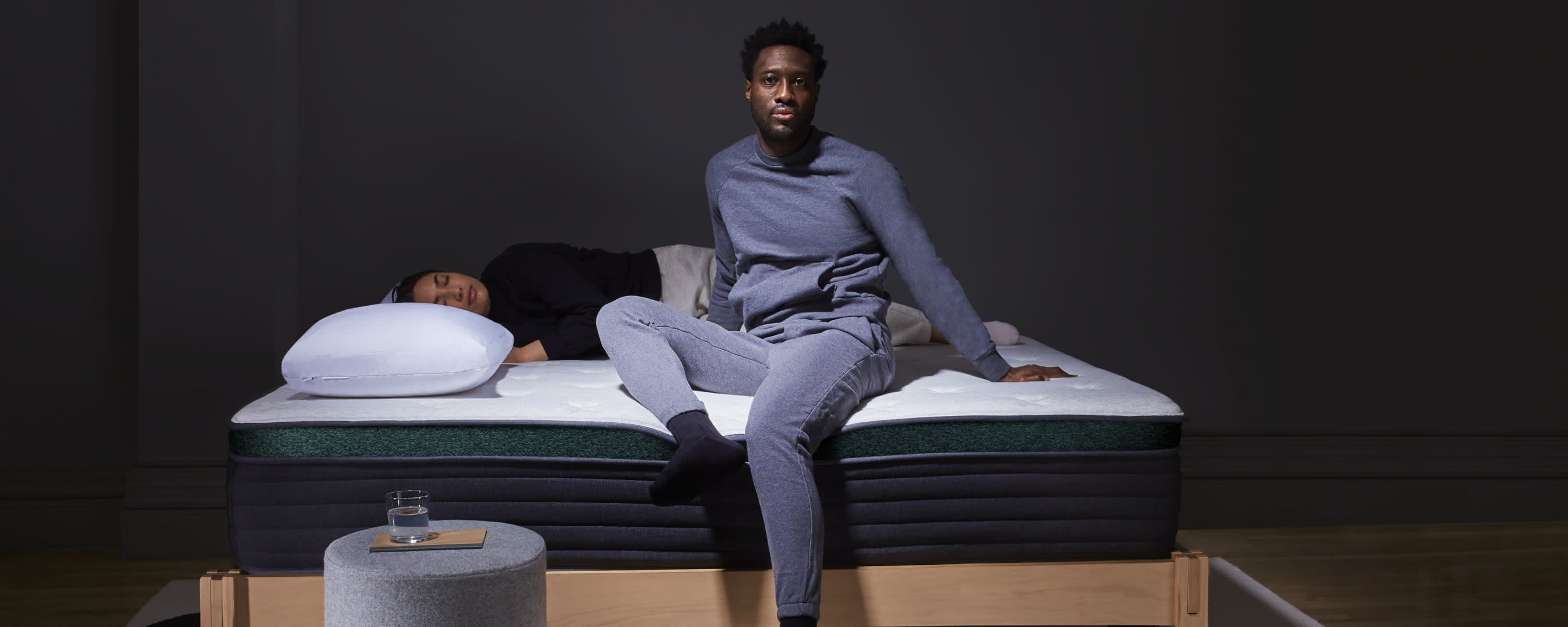 Two people on Twilight Luxe mattress