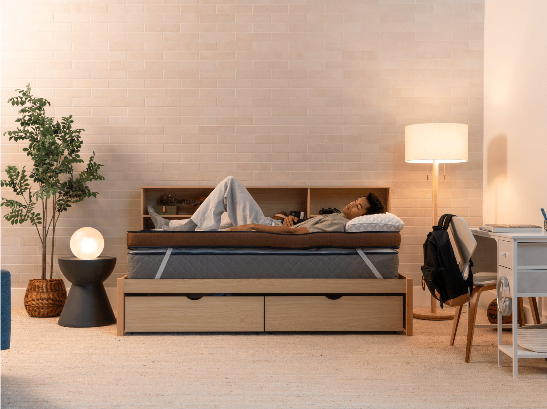 young man sleeping on the Copperflex 401 Mattress Topper