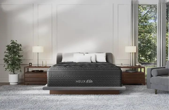 A rendered image showing the Helix Elite mattress in a bedroom scene