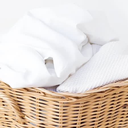 Wicker basket of laundry