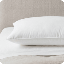A lifestyle render of the Helix Down and Feather Pillow