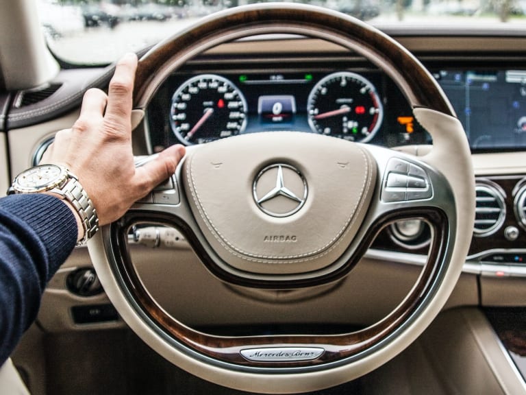 person driving a Mercedes Benz| © Nicolai Berntsen