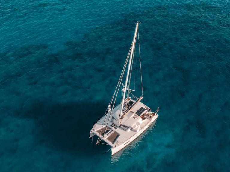 Catamaran in the blue sea| ©Jess Loiterton