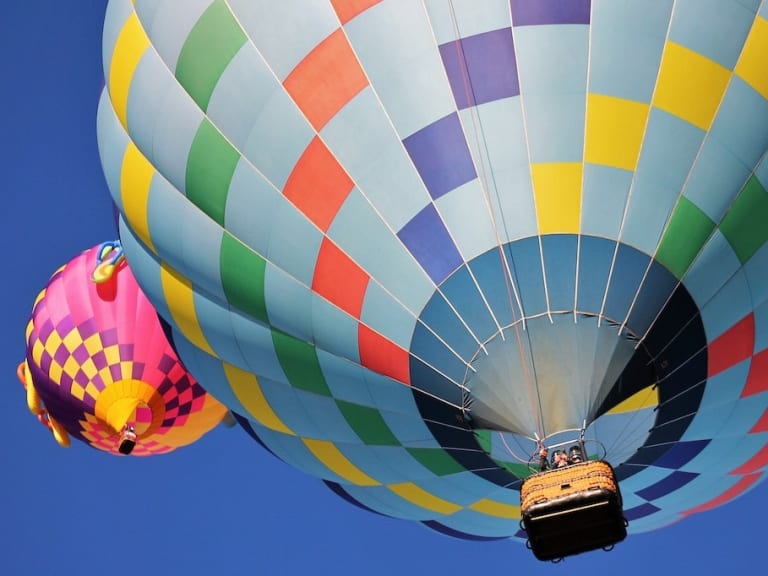 Blue And Multicoloured Hot Air Balloon Under A Blue Sky| ©Pixabay