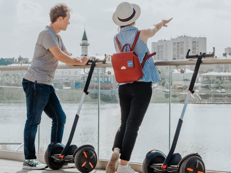 man and woman on segway|© Timur Romanov