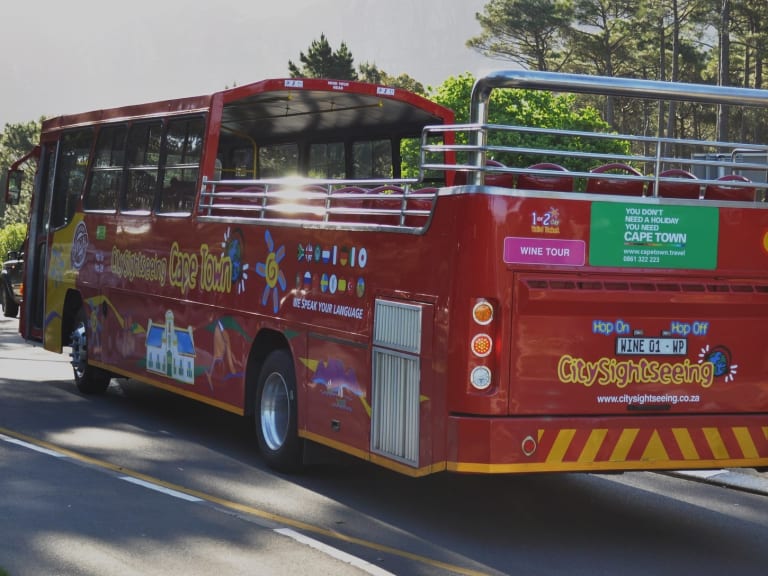 red bus on the road|©Antony Whitehead