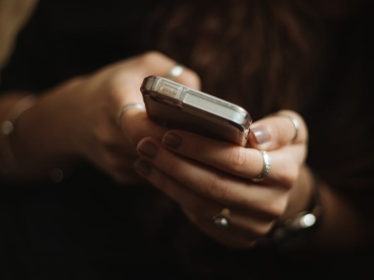 mobile phone person in hand|© Priscilla Du Preez 🇨🇦