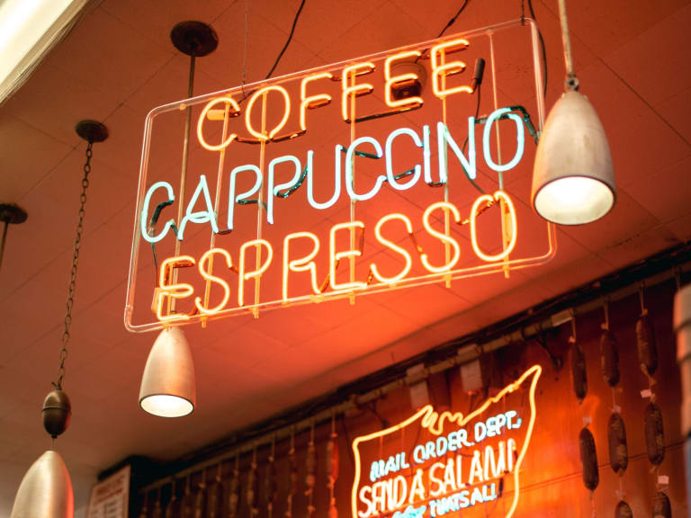 A brightly lit sign at one of Manhattan's coffee shops.| ©Hellotickets