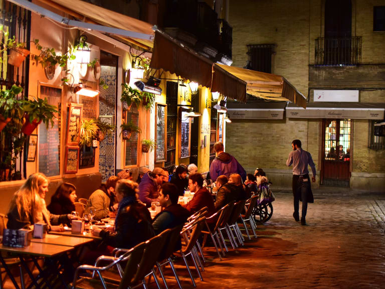 Enjoying tapas in the nightlife of Seville| ©Naval S