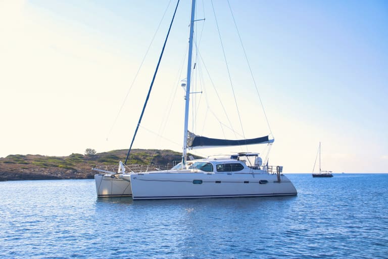 Catamaran in Menorca's waters| ©Miquel Gelabert