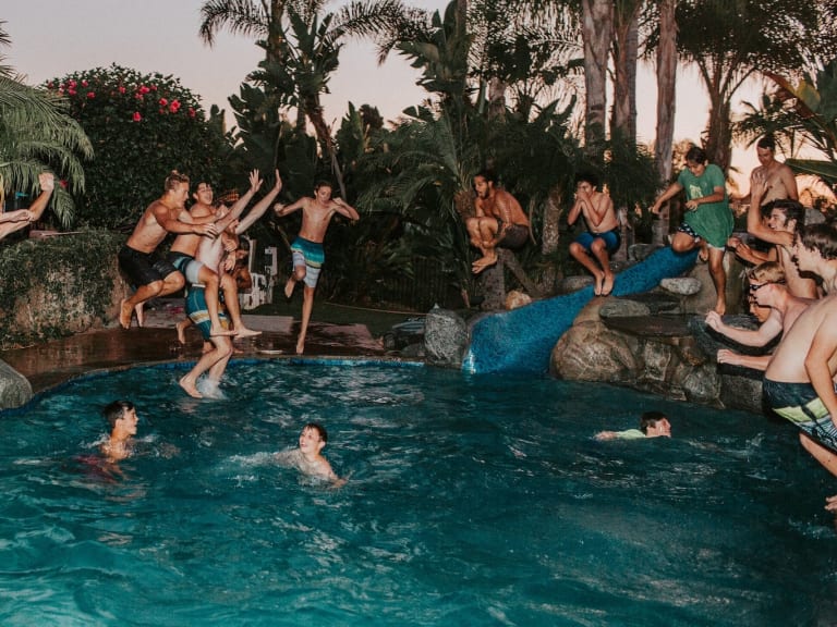people jump in the pool| © Jed Villejo