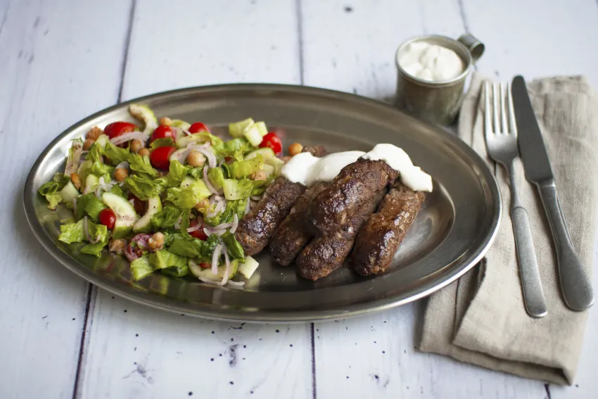 Lamb Kebabs with Tahini Yogurt and Shirazi Salad