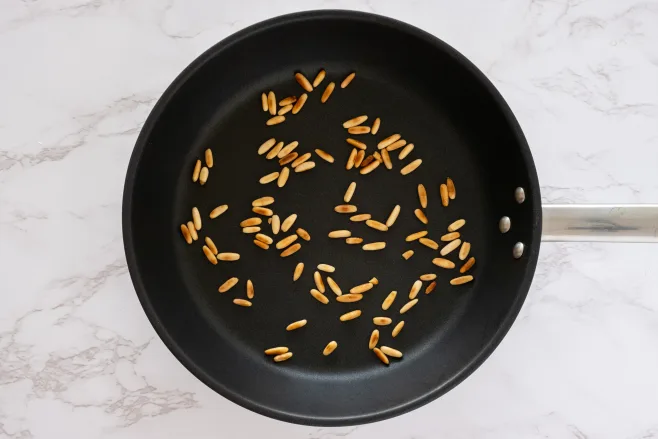 Toast pine nuts