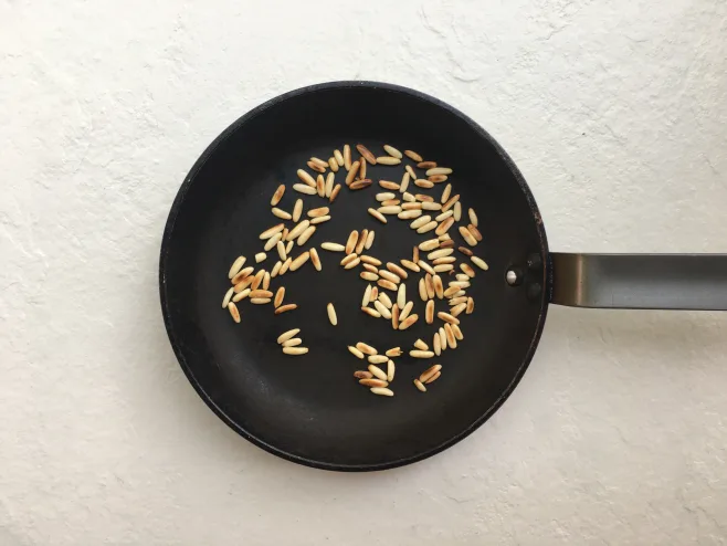 Toast pine nuts