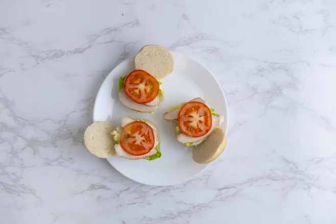 Add chicken and tomato