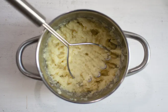 Boil and mash potatoes