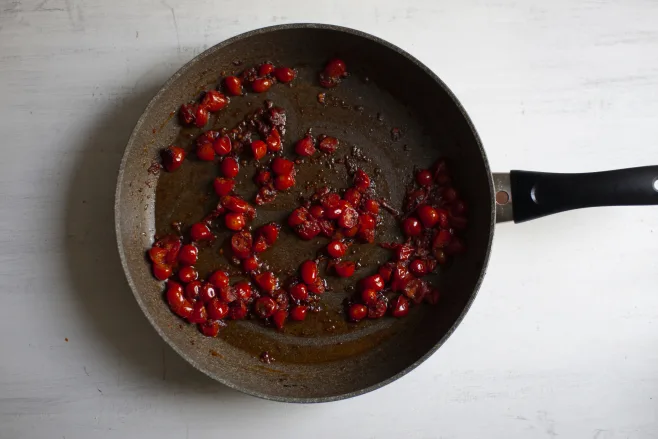 Simmer tomatoes