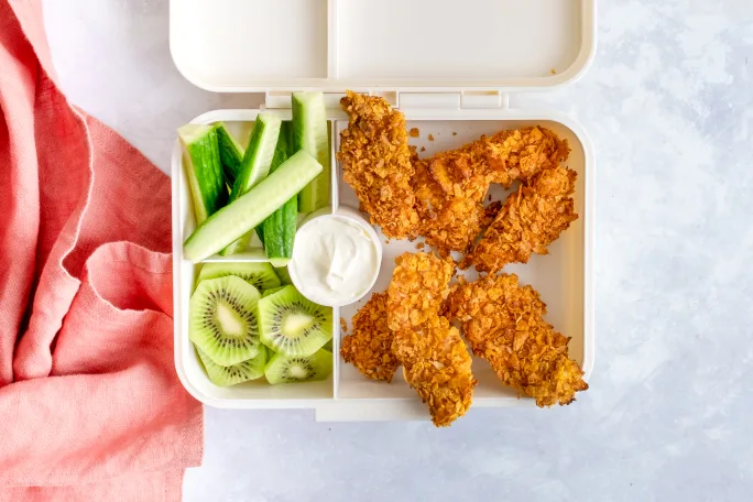Tex Mex Crispy Chicken Tenders with Kiwi, Cucumber and Sour Cream