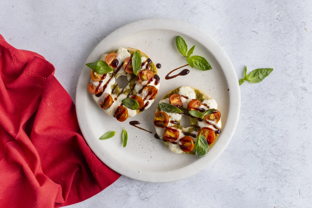 Caprese Bagel with Pesto, Fresh Mozzarella, Tomato & Balsamic Glaze