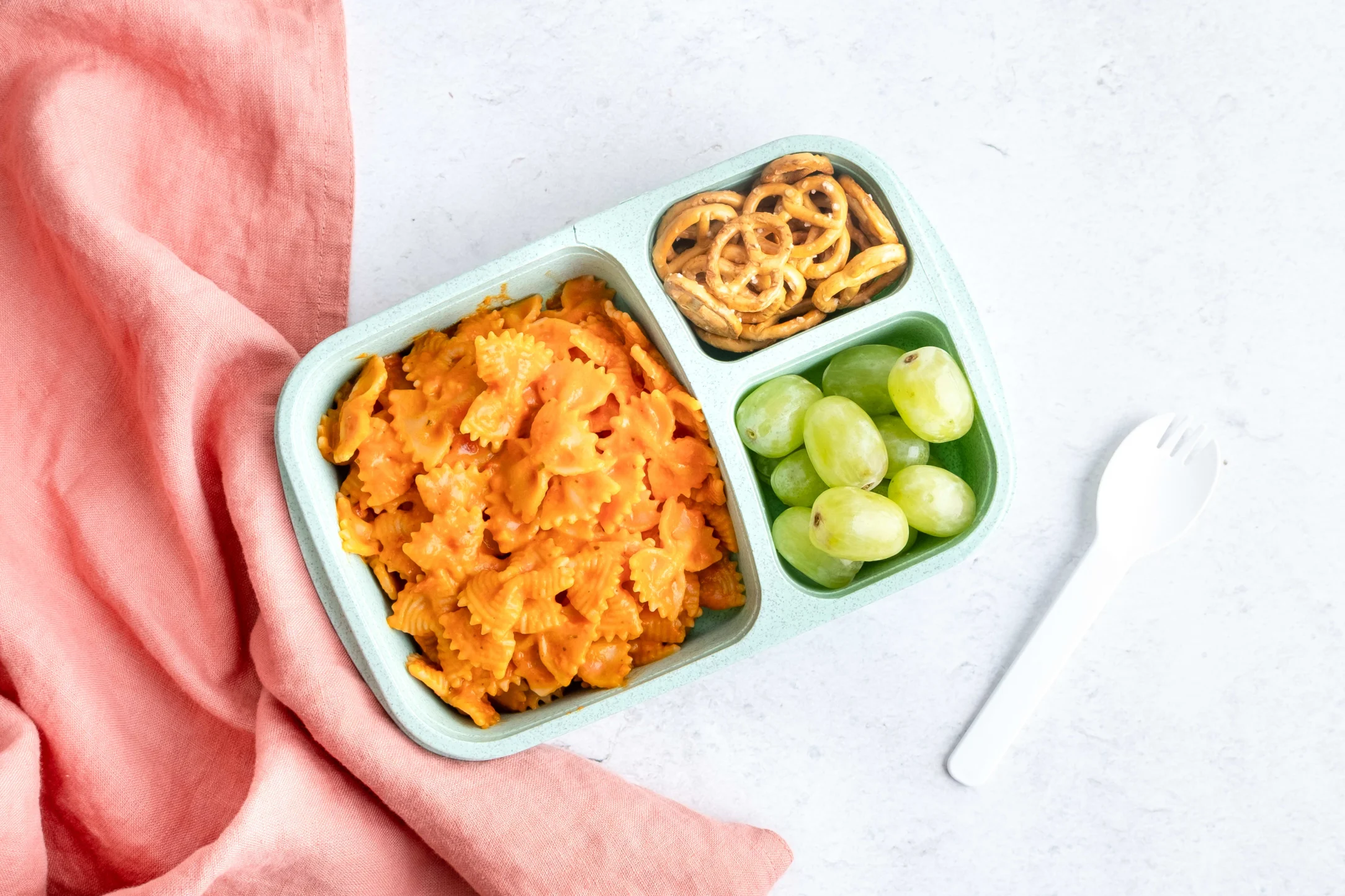 Tomato Mascarpone Pasta with Crispy Pretzels and Grapes