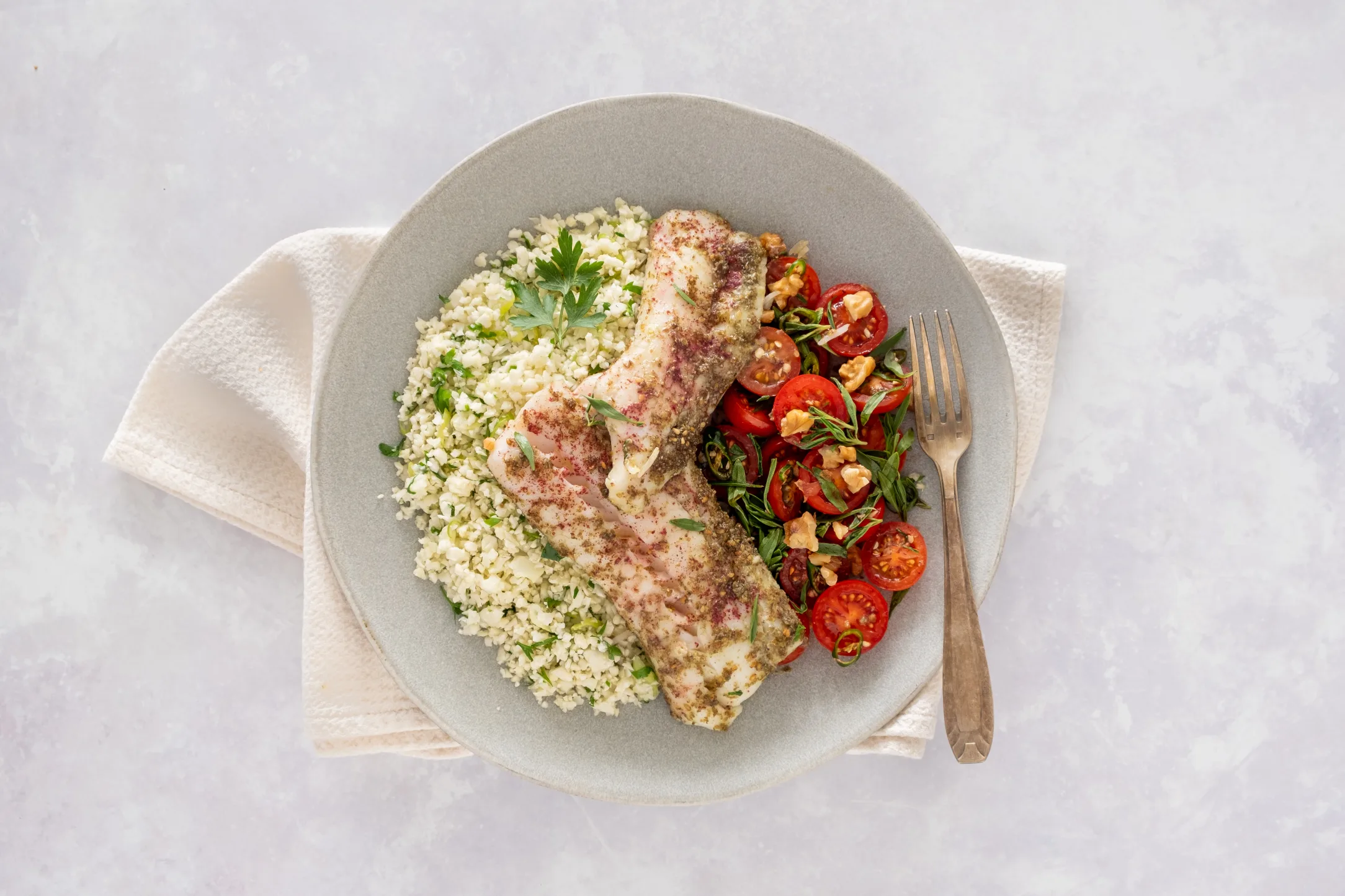 Zaatar Baked Cod with Tomato, Chilli, Walnut Salad and Herby Cauli Rice