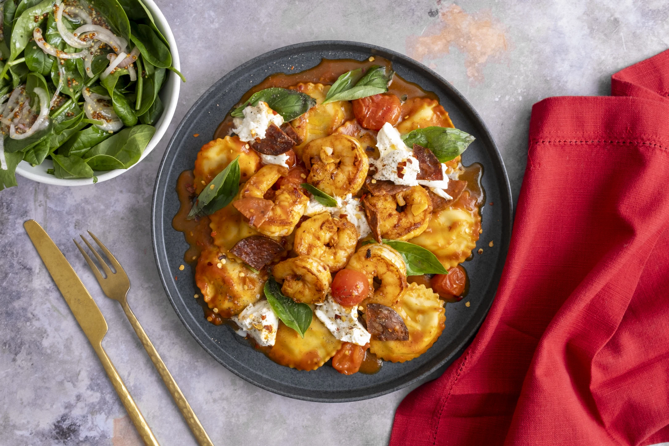Spicy Jumbo Prawn and Chorizo with Tomato Mozzarella Ravioli and Baby Spinach Salad